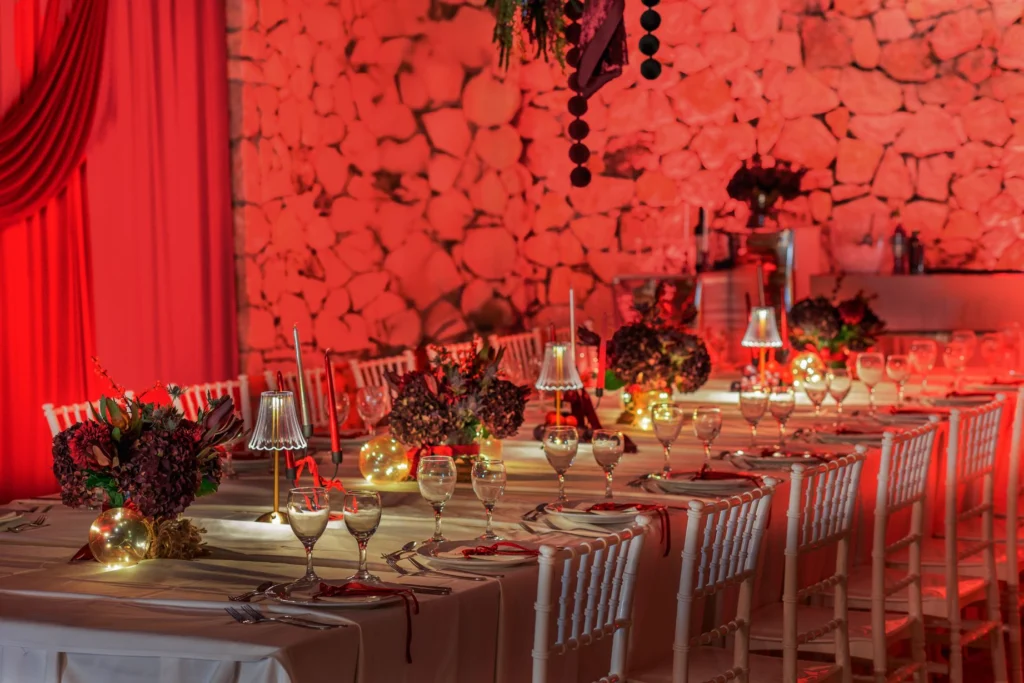 christmas event decor in intimate venue with candlelight